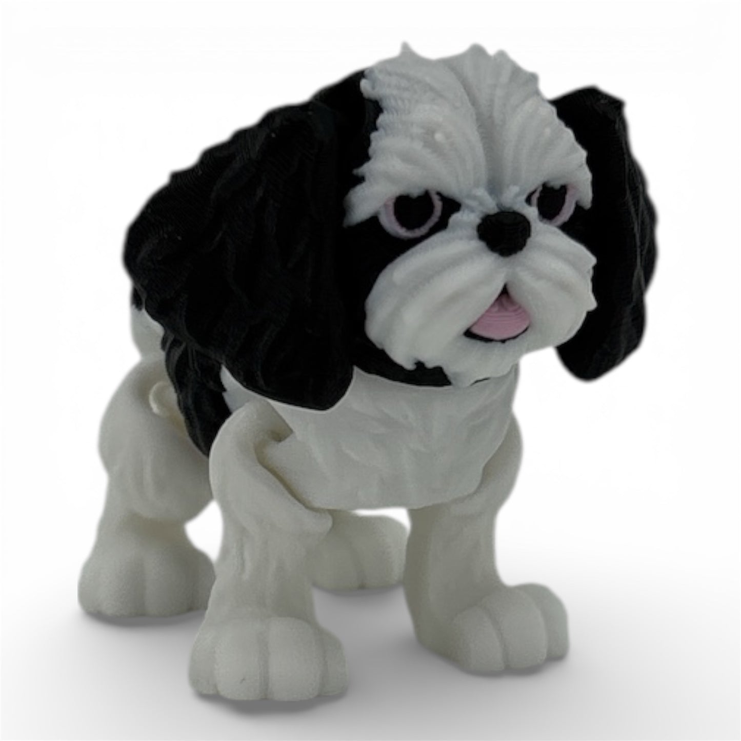 Flexi figure of a black and white Shih Tzu dog on a white background