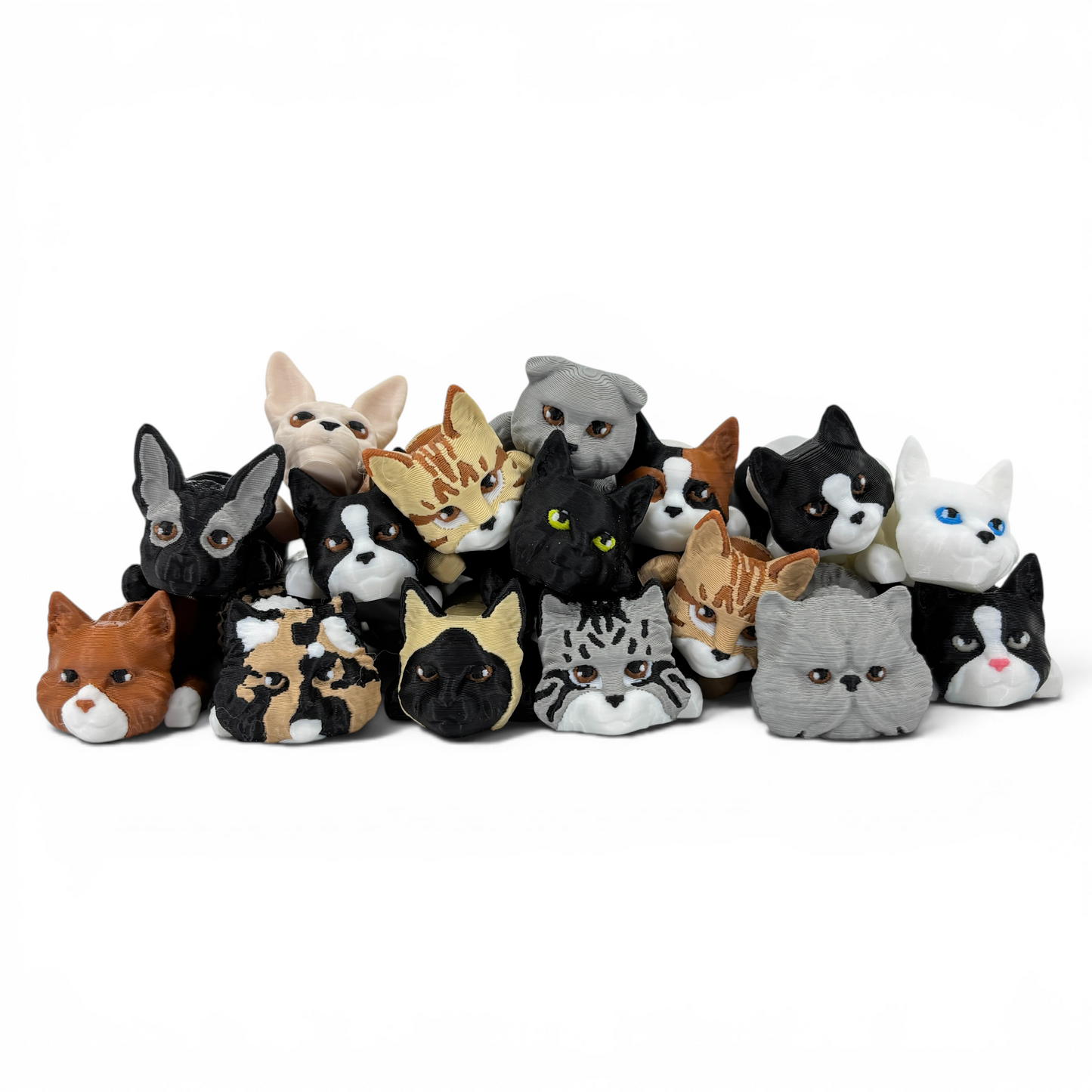 Collection of small cat keychains on a white background