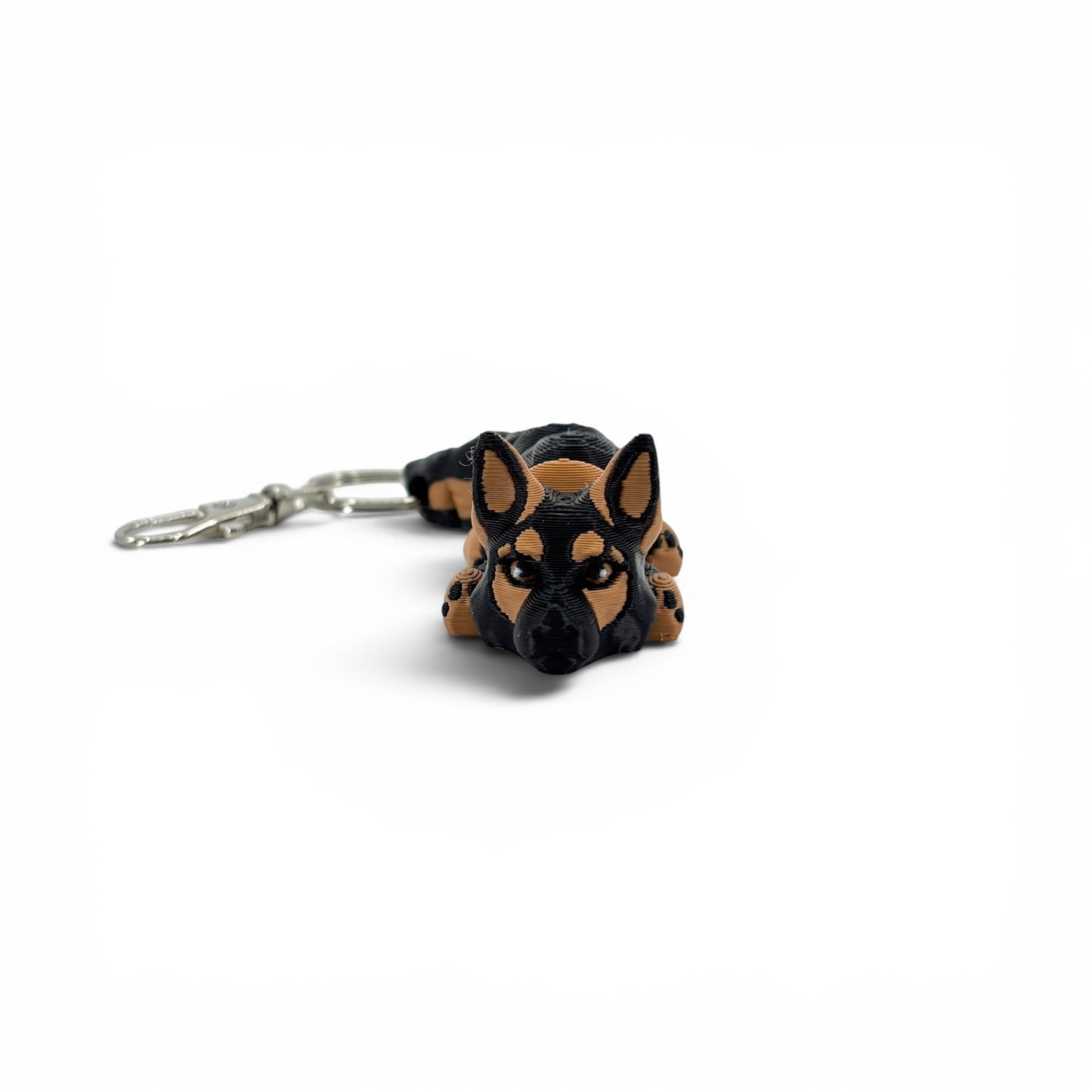 Front view of German Shepherd Dog keychain in a sable pattern in brown and black.