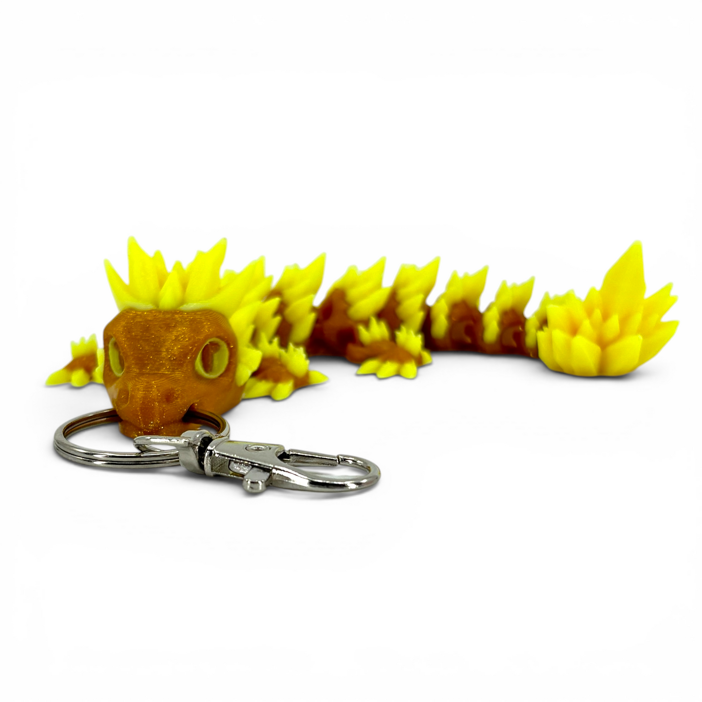 yellow crystal dragon keychain on white background