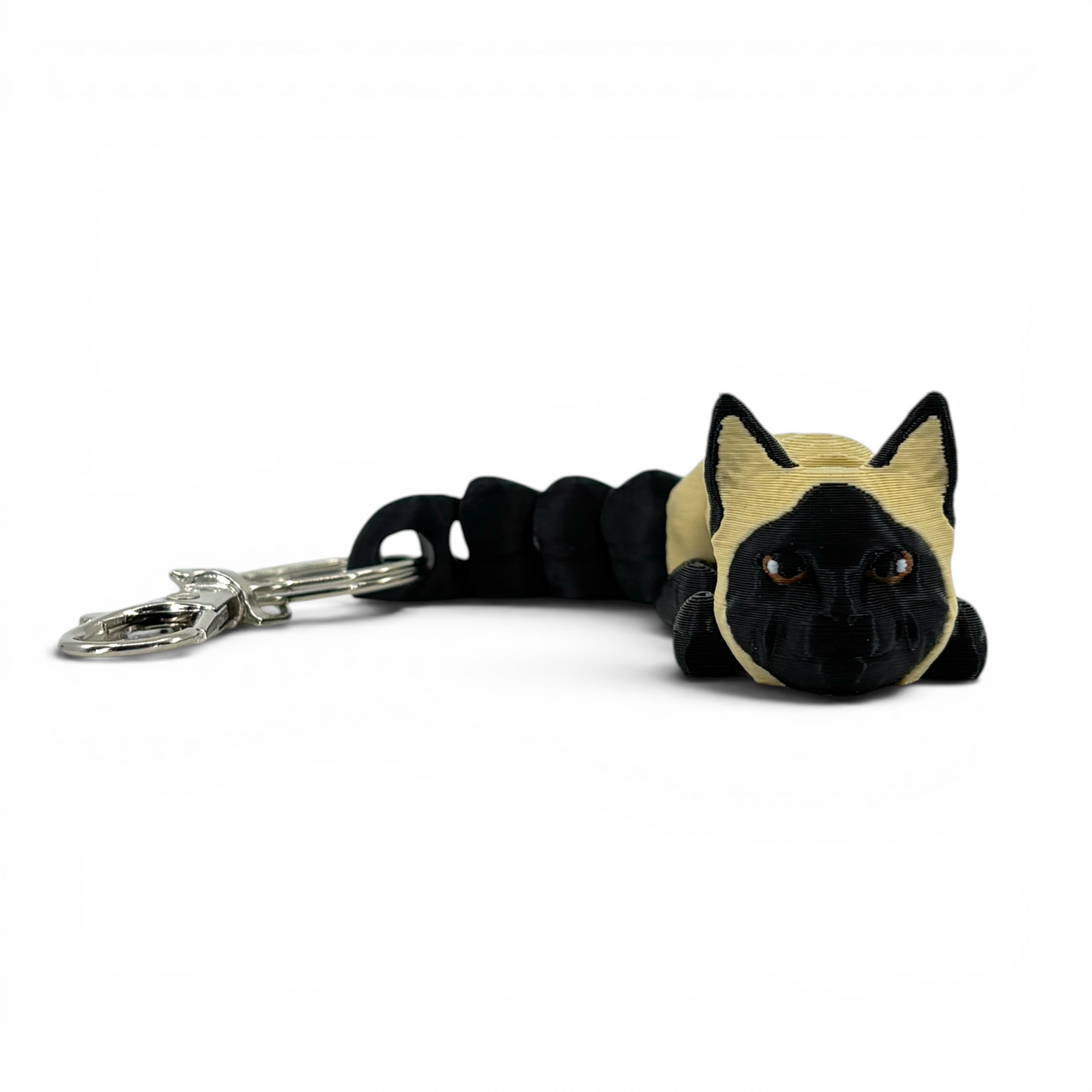 siamese cat keychain on a white background