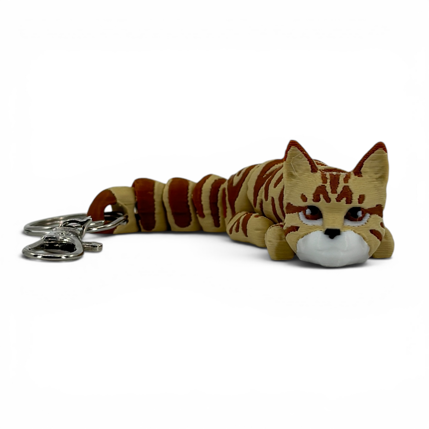 Cat-shaped keychain on a white background