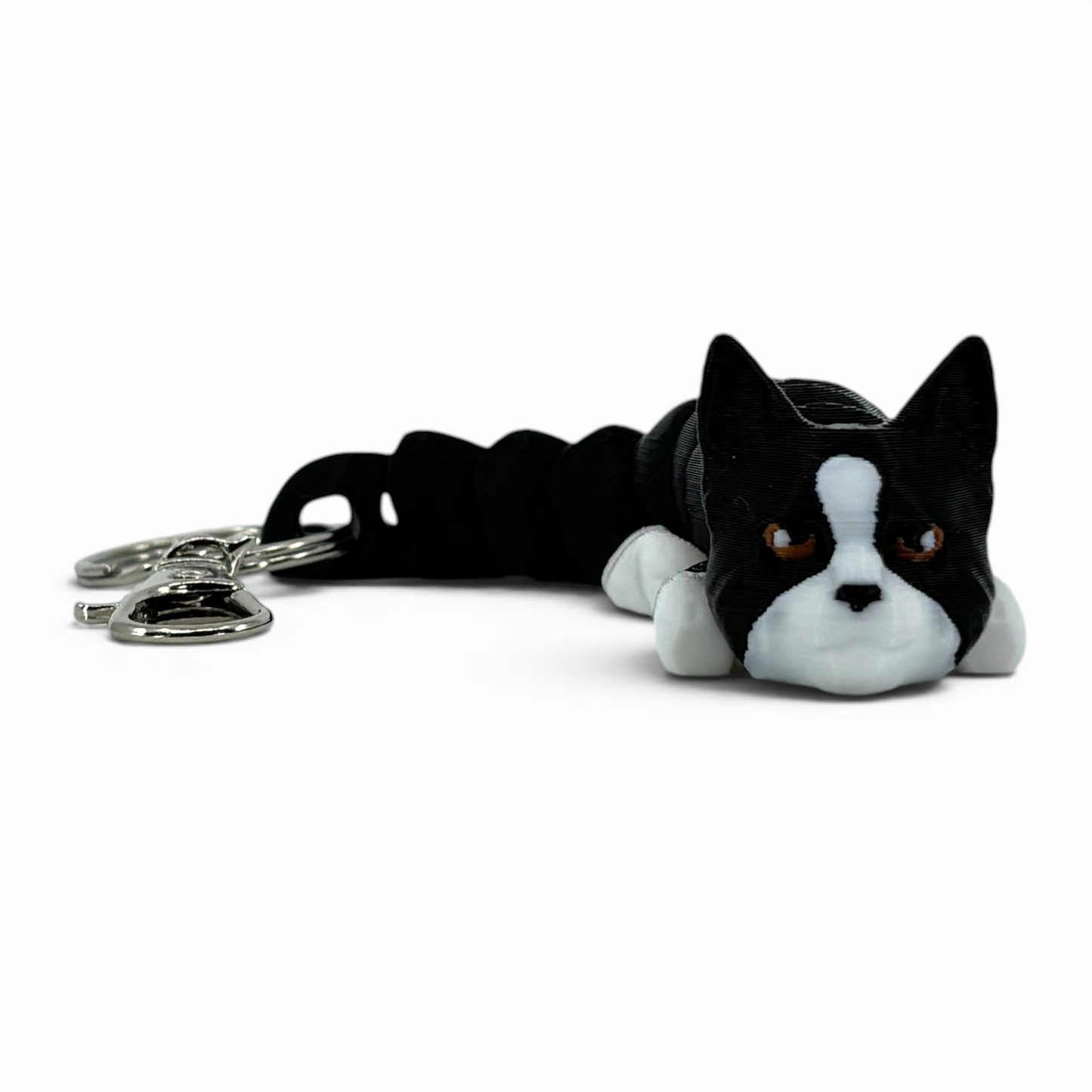 Black and white cat keychain on a white background