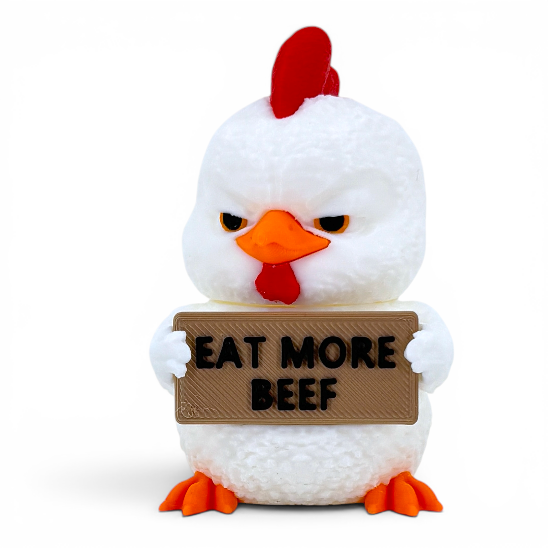 3D printed chicken holding a sign that says 'Eat More Beef' on a white background