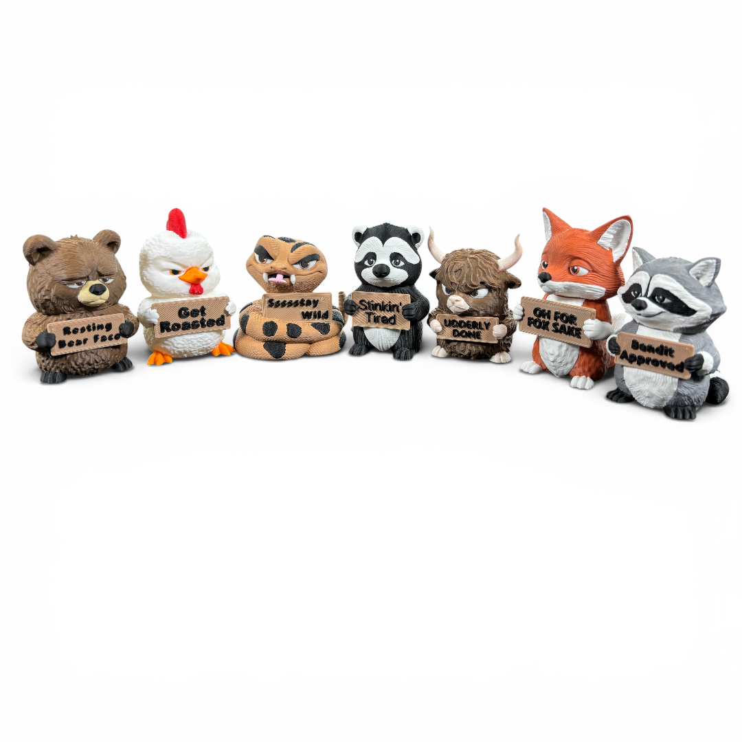 Set of animal figurines holding signs on a white background