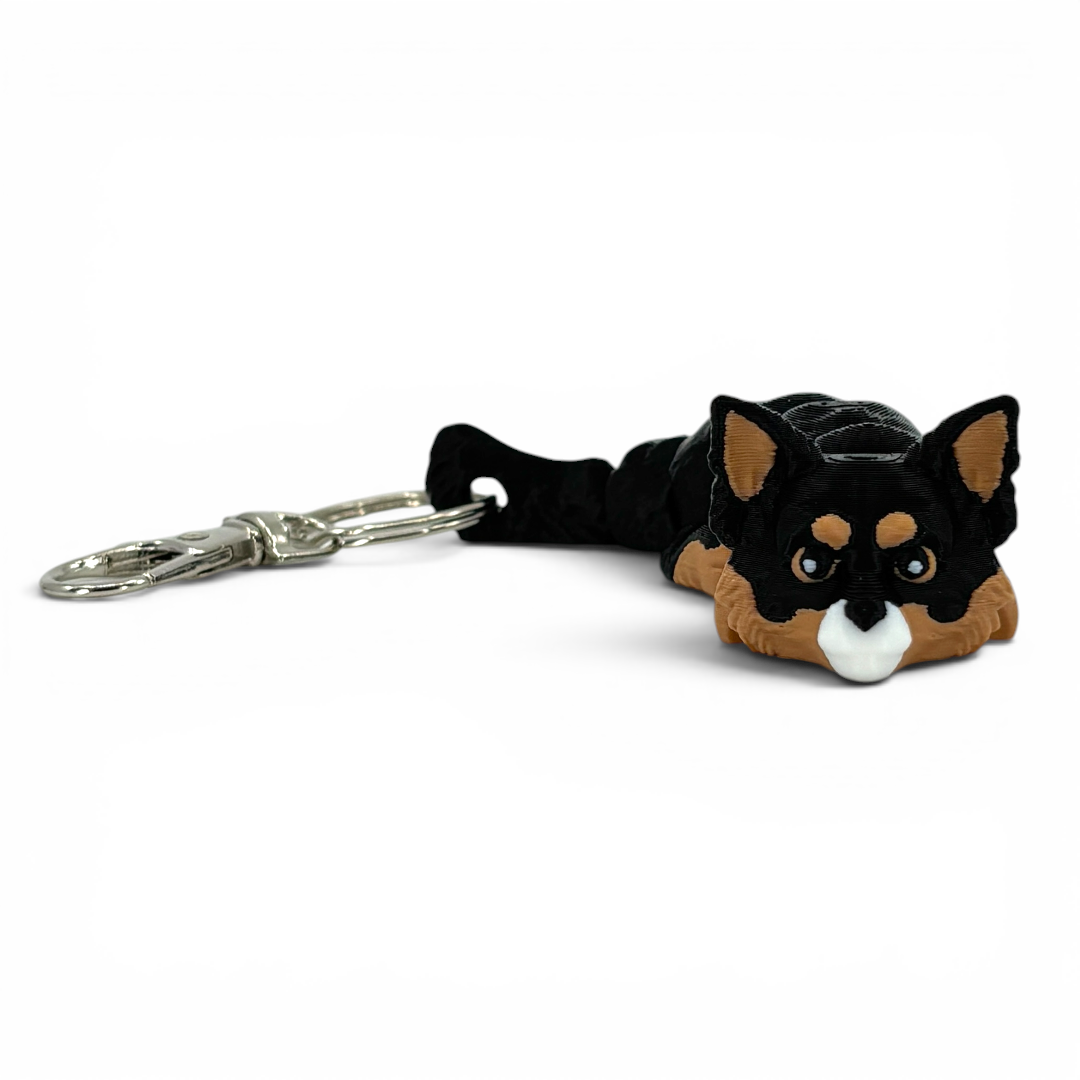 dog-shaped keychain on white background